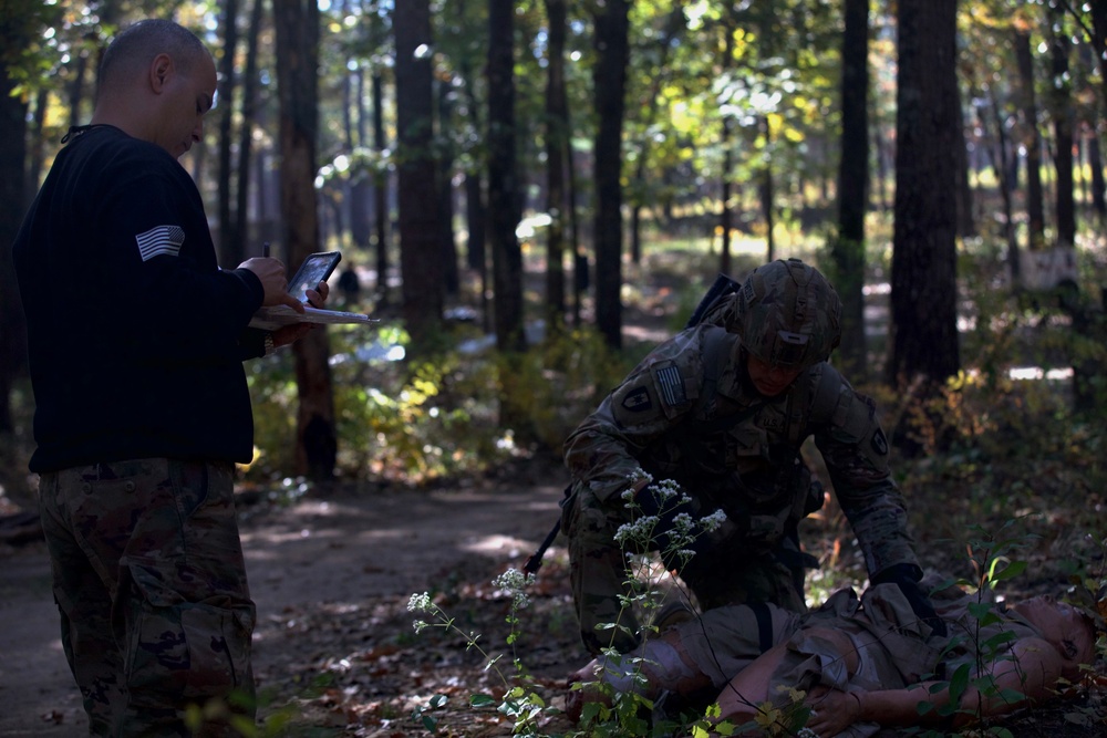 Soldiers compete in 44th Medical Brigade's Expert Field Medical Badge Competition