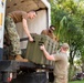 Arkansas Air National Guard members unload equipment for Continuing Promise 2022