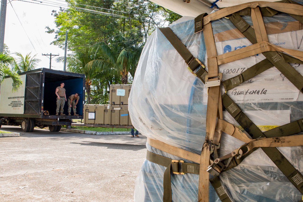 Arkansas Air National Guard members unload equipment for Continuing Promise 2022