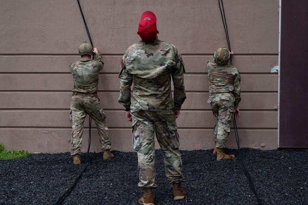 Andersen AFB Airmen participate in rappelling training