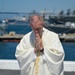 Roman Catholic Priest Takes Religious Service Where Needed Most