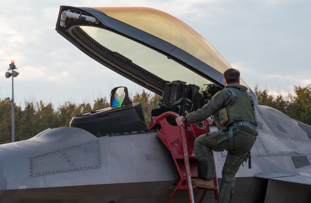 U.S. Air Force F-22 Raptors from the 90th Expeditionary Fighter Squadron integrate with the Royal Netherlands Air Force at Leeuwarden Air Base, Netherlands