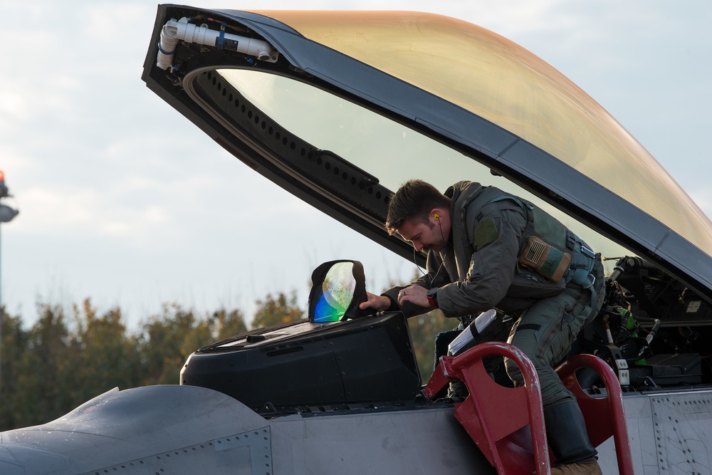 U.S. Air Force F-22 Raptors from the 90th Expeditionary Fighter Squadron integrate with the Royal Netherlands Air Force at Leeuwarden Air Base, Netherlands