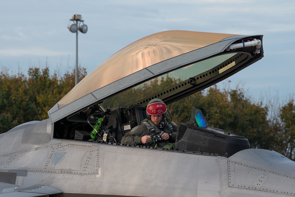 U.S. Air Force F-22 Raptors from the 90th Expeditionary Fighter Squadron integrate with the Royal Netherlands Air Force at Leeuwarden Air Base, Netherlands