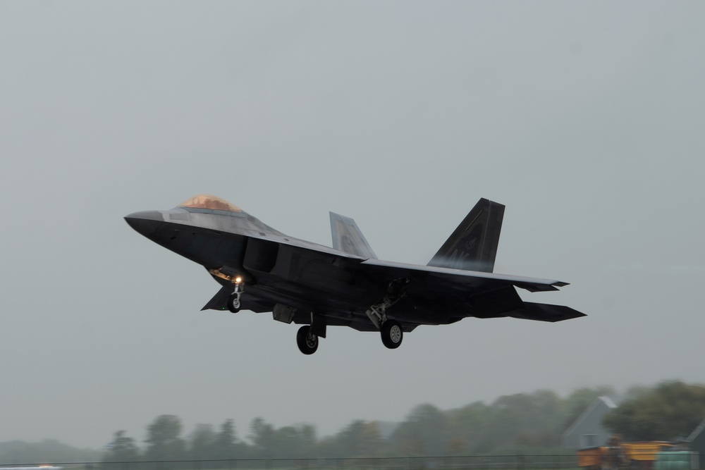 U.S. Air Force F-22 Raptors from the 90th Expeditionary Fighter Squadron integrate with the Royal Netherlands Air Force at Leeuwarden Air Base, Netherlands