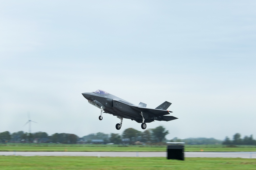 U.S. Air Force F-22 Raptors from the 90th Expeditionary Fighter Squadron integrate with the Royal Netherlands Air Force at Leeuwarden Air Base, Netherlands