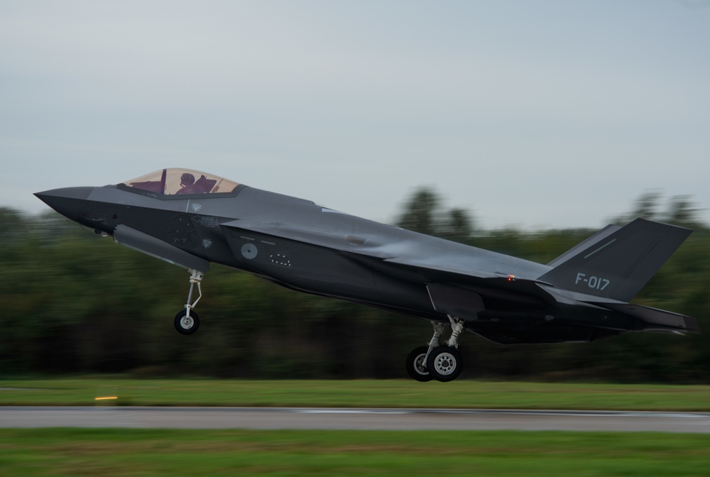 U.S. Air Force F-22 Raptors from the 90th Expeditionary Fighter Squadron integrate with the Royal Netherlands Air Force at Leeuwarden Air Base, Netherlands