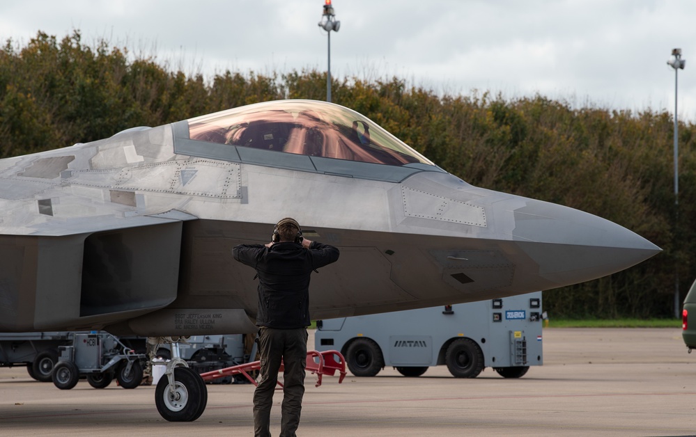 U.S. Air Force F-22 Raptors from the 90th Expeditionary Fighter Squadron integrate with the Royal Netherlands Air Force at Leeuwarden Air Base, Netherlands