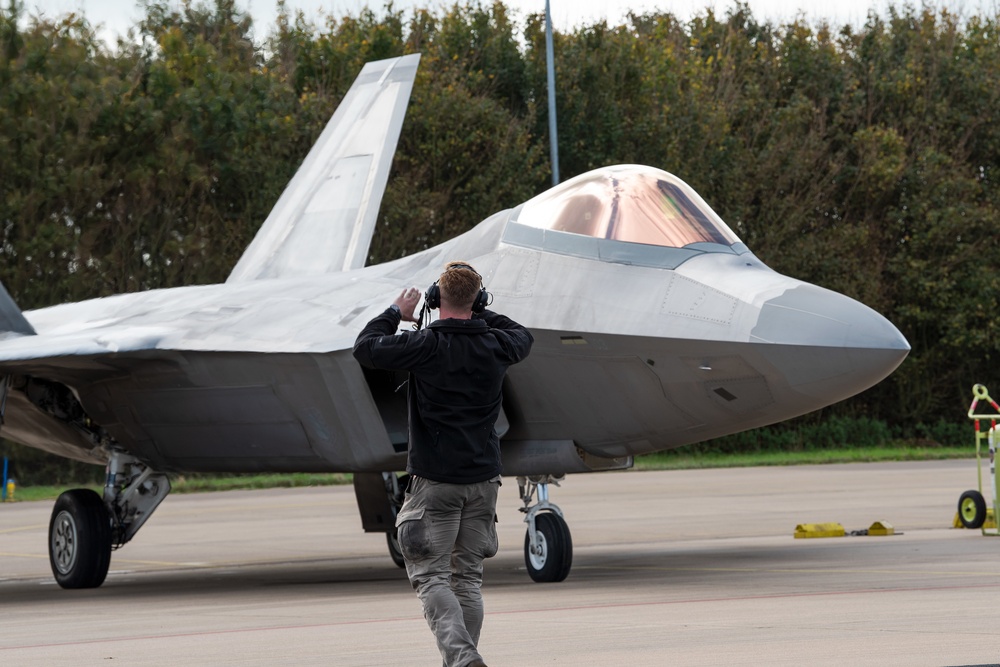 U.S. Air Force F-22 Raptors from the 90th Expeditionary Fighter Squadron integrate with the Royal Netherlands Air Force at Leeuwarden Air Base, Netherlands