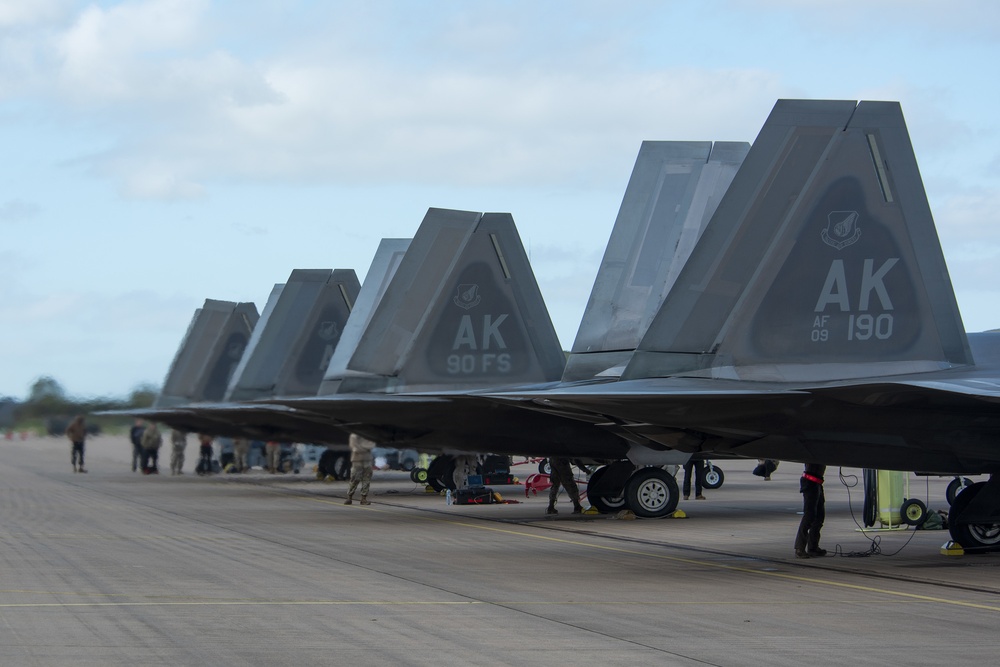 U.S. Air Force F-22 Raptors from the 90th Expeditionary Fighter Squadron integrate with the Royal Netherlands Air Force at Leeuwarden Air Base, Netherlands