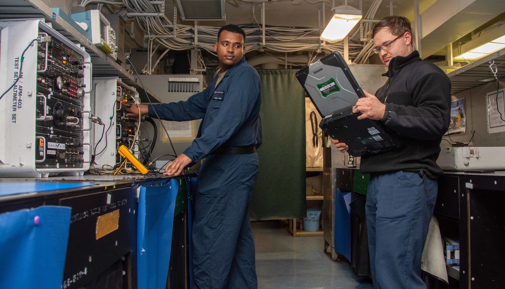 USS Ronald Reagan (CVN 76) Sailors perform preventative maintenance