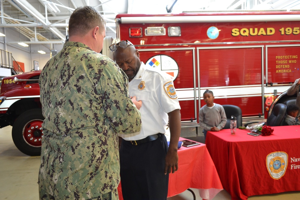 Assistant Fire Chief receives Navy Meritorious Civilian Service Medal