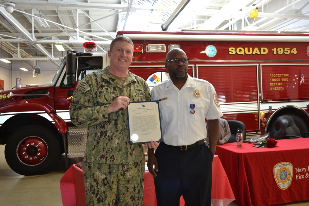 Assistant Fire Chief receives Navy Meritorious Civilian Service Medal