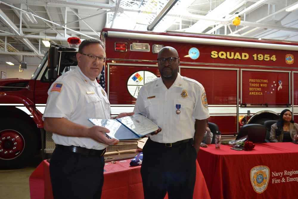 Assistant Fire Chief receives Navy Meritorious Civilian Service Medal