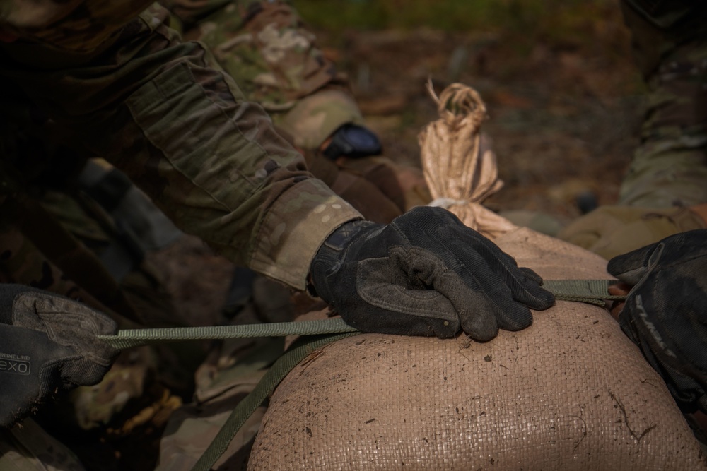 Soldiers compete in 44th Medical Brigade's Expert Field Medical Badge Competition