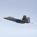 F-22s and HH-60Gs fly over JBER
