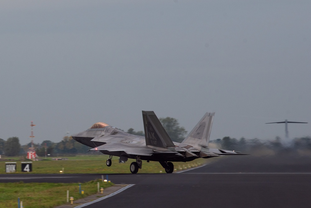 U.S. Air Force F-22 Raptors from the 90th Expeditionary Fighter Squadron participate in NATO’s Steadfast Noon