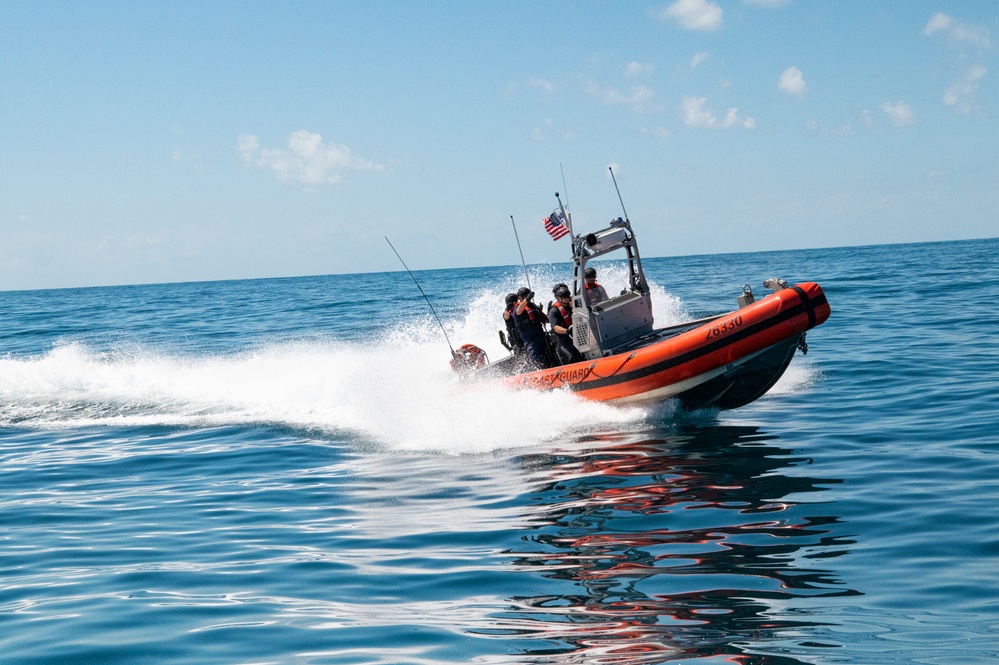 Coast Guard Cutter Hamilton crewmembers conduct pursuit training while underway in the Atlantic Ocean