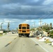 School Buses Transport Students To and From School in Neighborhoods Impacted by Hurricane Ian