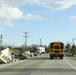 School Buses Transport Students To and From School in Neighborhoods Impacted by Hurricane Ian