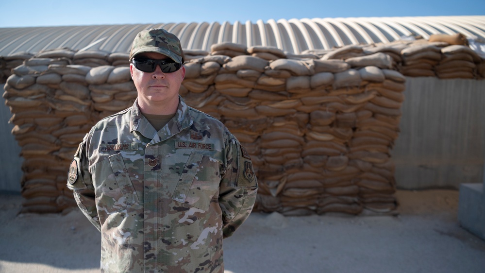 Tech. Sgt. Cory Williams coined by 332d Air Expeditionary Wing Commander Brig. Gen. Ryan R. Messer