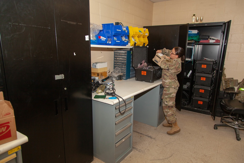 A PSYOP Soldier Repairs Equipment