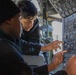 Sailors prepare E-6B Mercury for flight