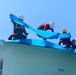 Crews Work To Install Blue Roofs as Part of the Army Corps of Engineers Operation Blue Roof