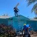 Crews Work To Install Blue Roofs as Part of the Army Corps of Engineers Operation Blue Roof