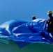 Crews Work To Install Blue Roofs as Part of the Army Corps of Engineers Operation Blue Roof