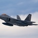 F-22s fly over JBER