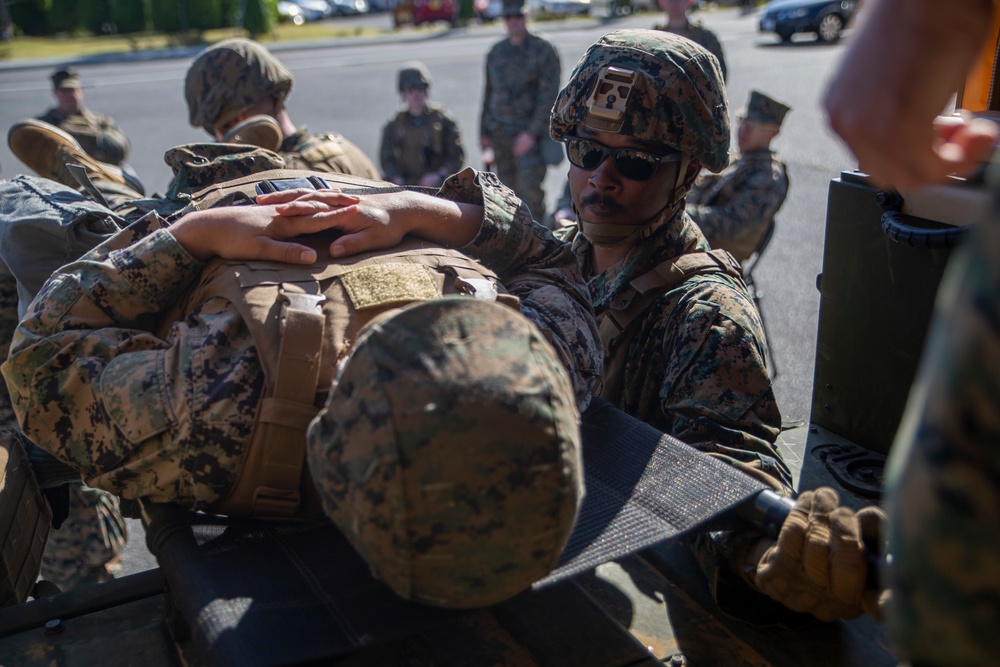 MAG-12 Navy Corpsmen hone their skills during a flight line aid station exercise