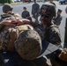 MAG-12 Navy Corpsmen hone their skills during a flight line aid station exercise