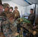 MAG-12 Navy Corpsmen hone their skills during a flight line aid station exercise