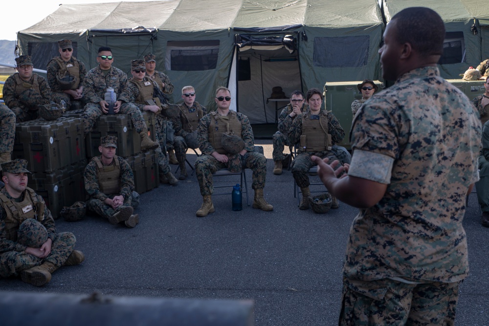 MAG-12 Navy Corpsmen hone their skills during a flight line aid station exercise