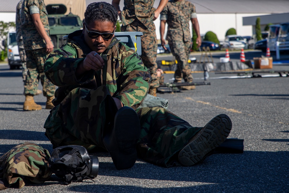 MAG-12 Navy Corpsmen hone their skills during a flight line aid station exercise