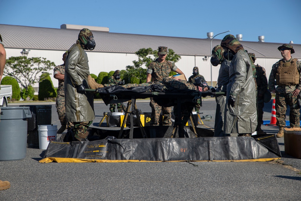 MAG-12 Navy Corpsmen hone their skills during a flight line aid station exercise