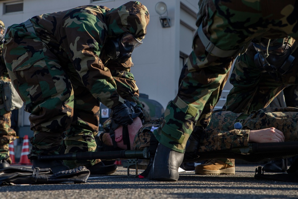 MAG-12 Navy Corpsmen hone their skills during a flight line aid station exercise