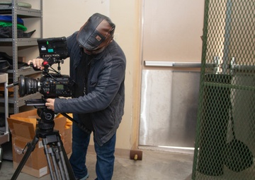 Camera Man Preps Equipment for Military Spirit Week