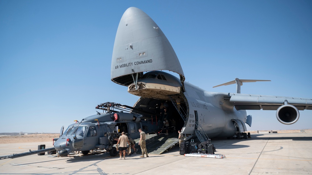 Airmen Unload Cargo Off A C-5M Galaxy