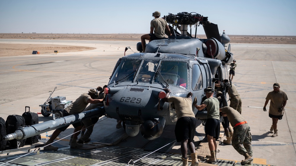 Airmen Unload Cargo off A C-5M Galaxy