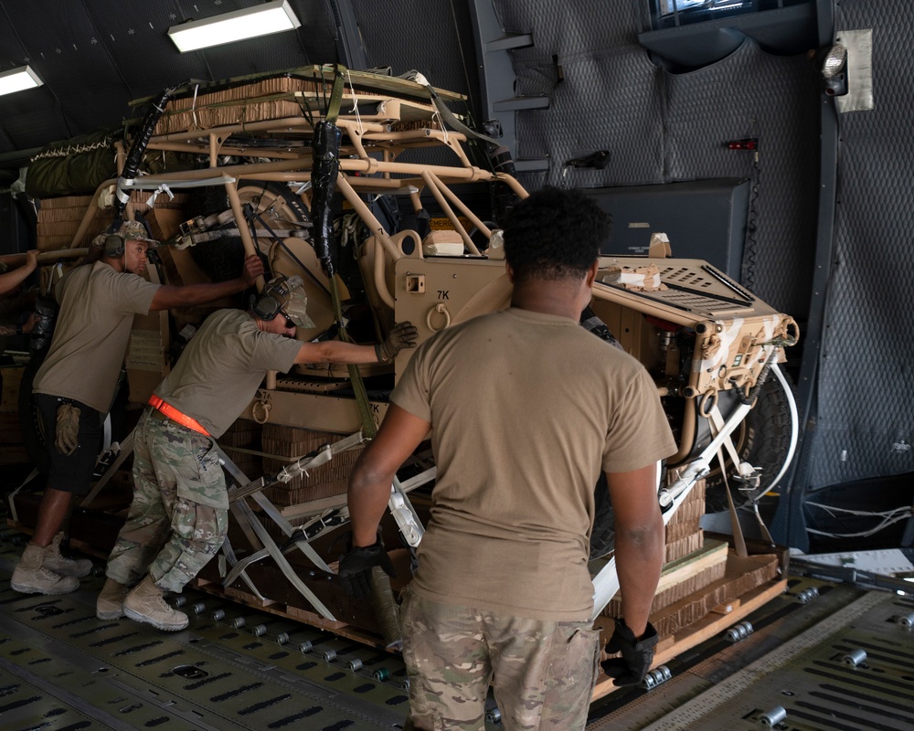 Airmen Unload Cargo Off A C-5M Galaxy
