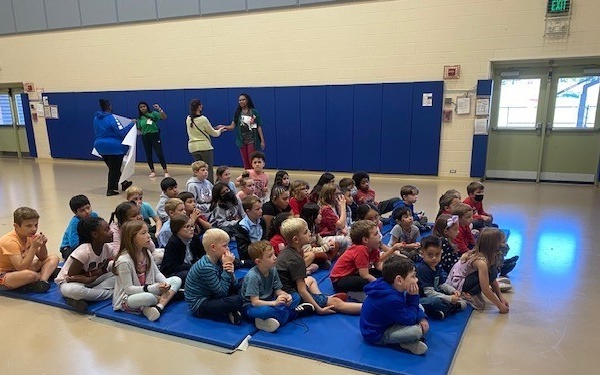 Children listen to a talk about the dangers of drug use at the Joint Base Myer-Henderson Hall Child Development Center