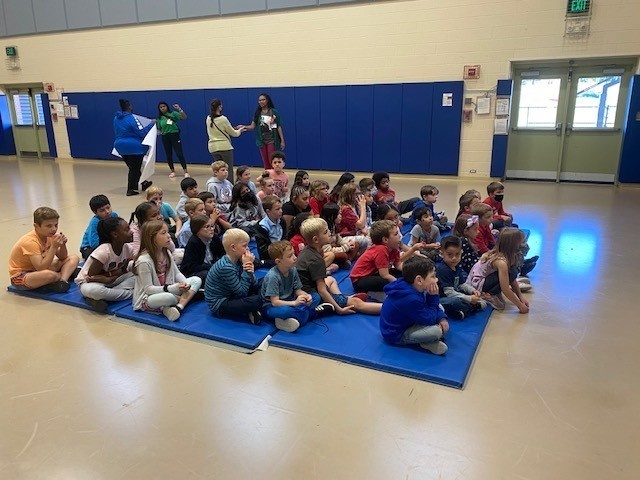 Children listen to a talk about the dangers of drug use at the Joint Base Myer-Henderson Hall Child Development Center