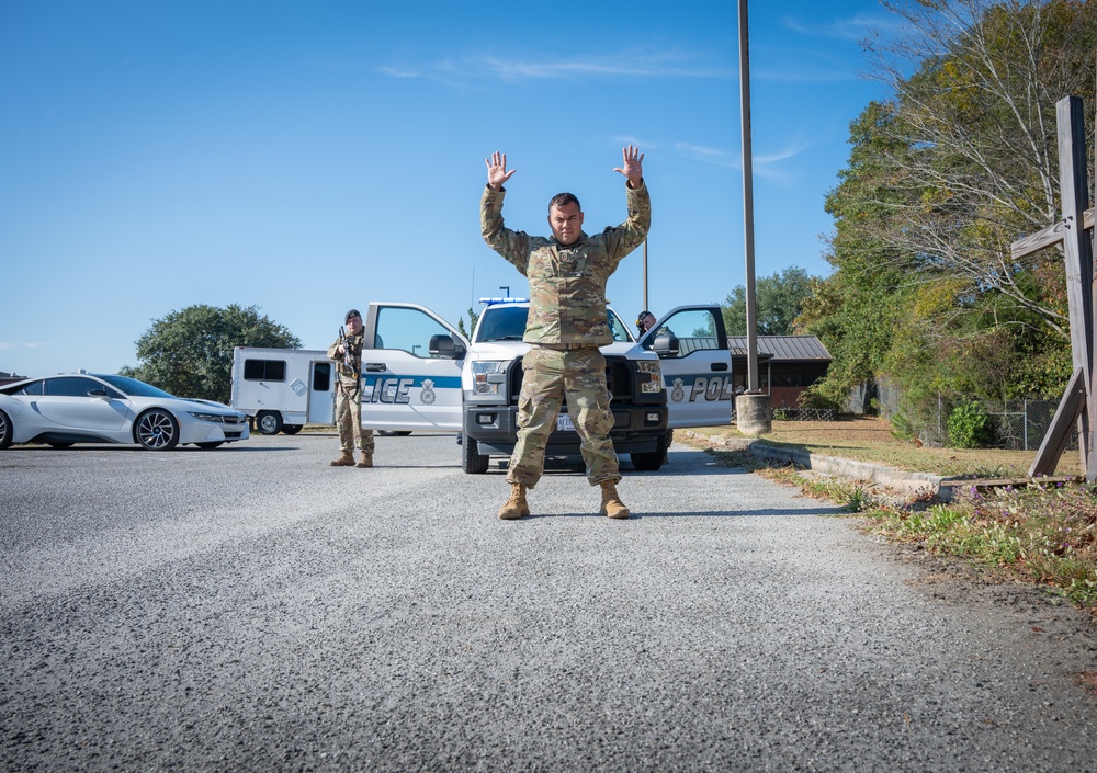 Photo of 116th Security Forces Squadron member(s) conducting a simulated high-risk traffic stop scenario