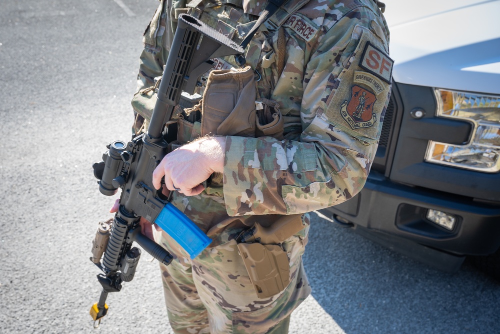 Photo of 116th Security Forces Squadron member(s) conducting a simulated high-risk traffic stop scenario