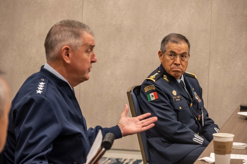 AMC Commander Gen. Mike Minihan engages with international partners during the Airlift/Tanker Association Symposium