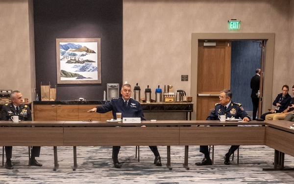 AMC Commander Gen. Mike Minihan engages with international partners during the Airlift/Tanker Association Symposium