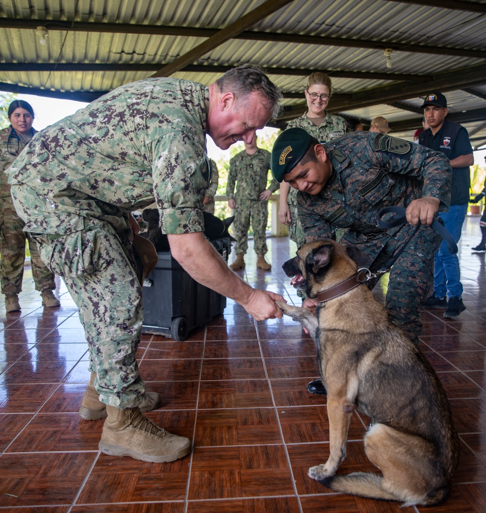 PHIBRON 4 CDRE, SHAKES HAND WITH GUATEMALAN MILITARY WORKING DOG