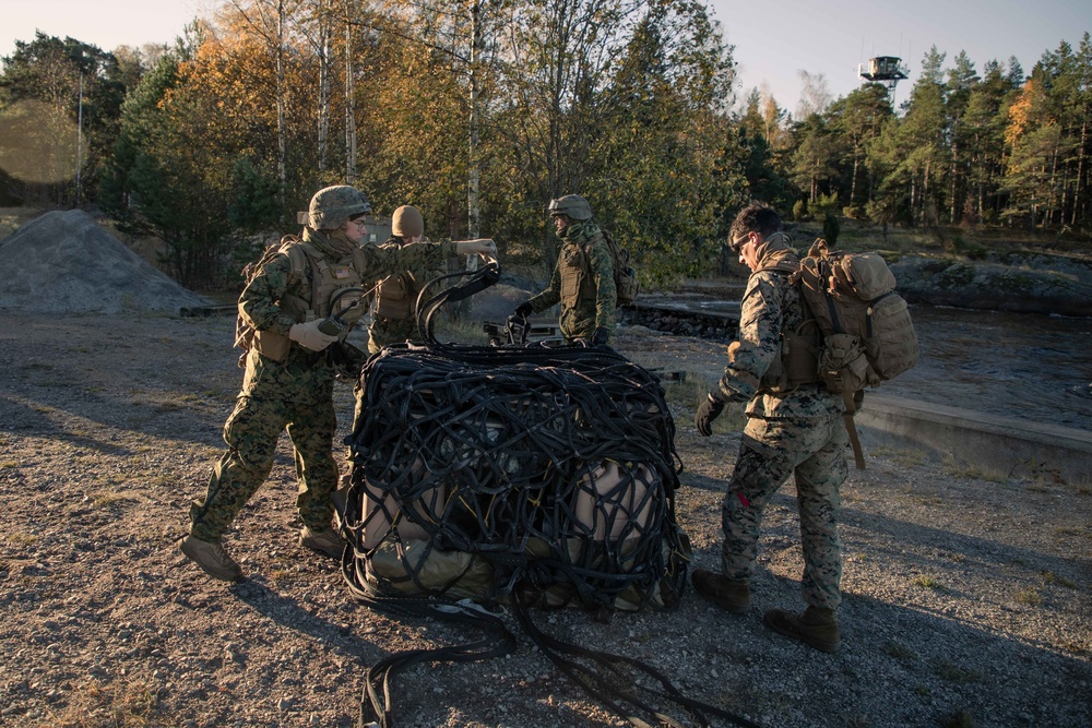 U.S. Marines Conduct Helicopter Support Team Resupply with Finnish Soldiers